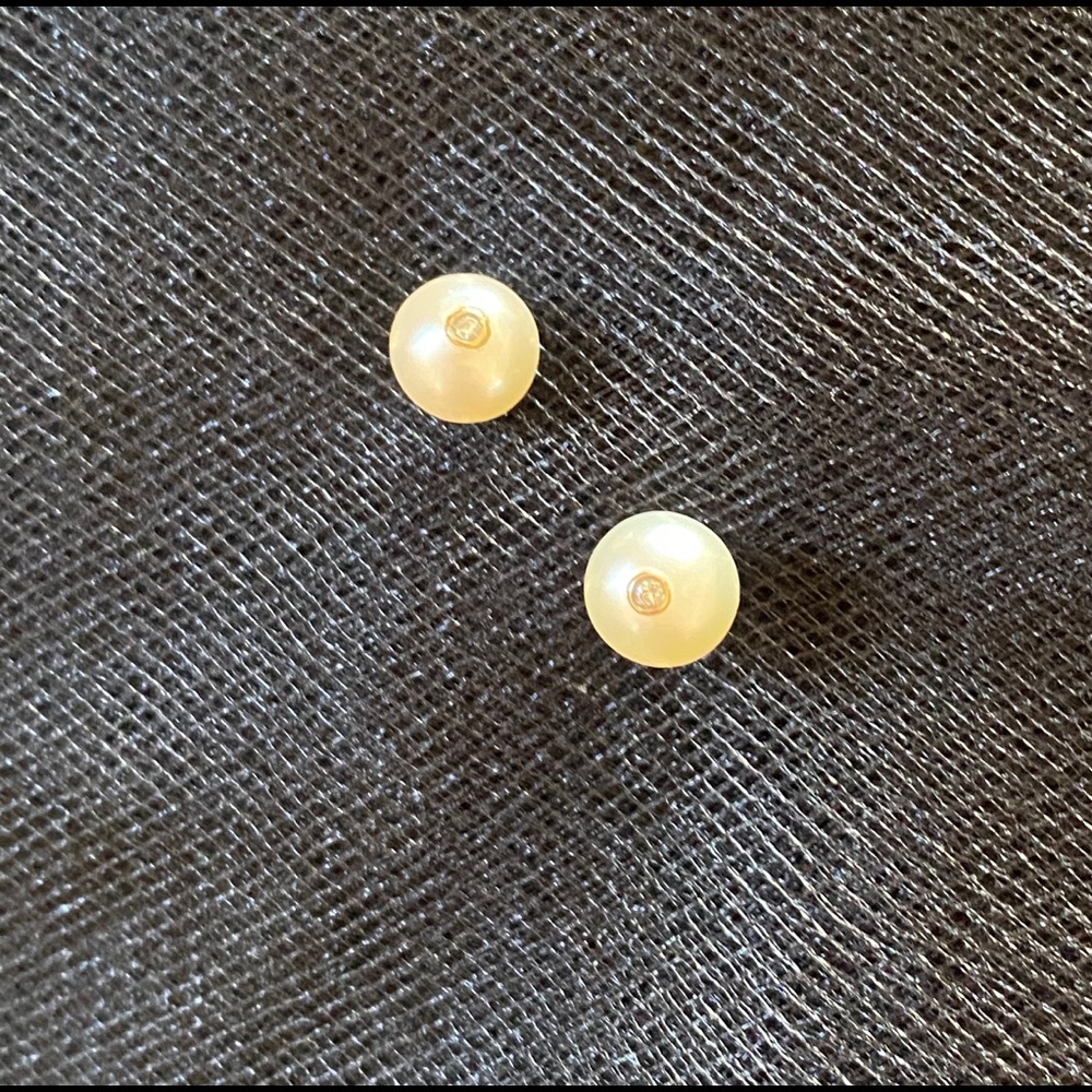 Cultured pearl and diamond earrings.